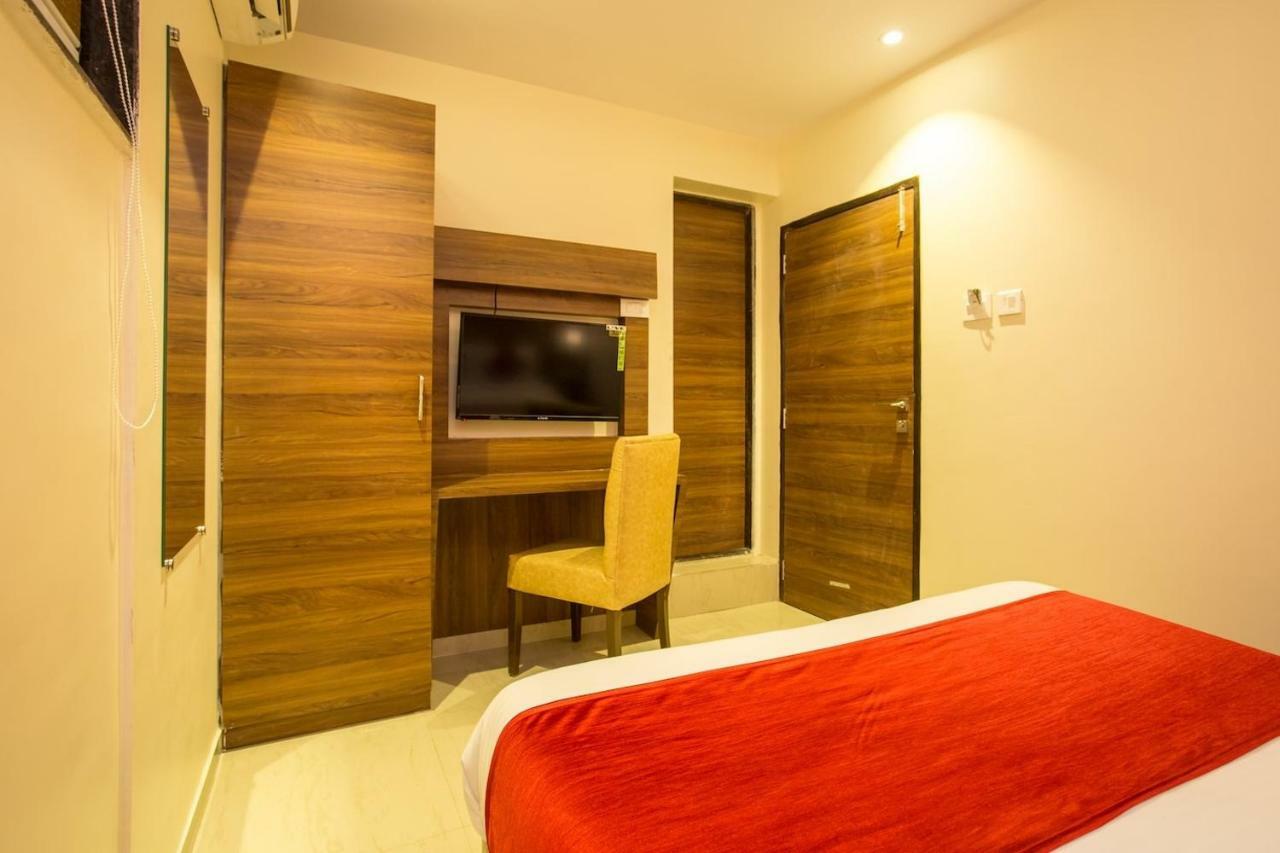 Hotel Grace Inn Мумбаи Экстерьер фото