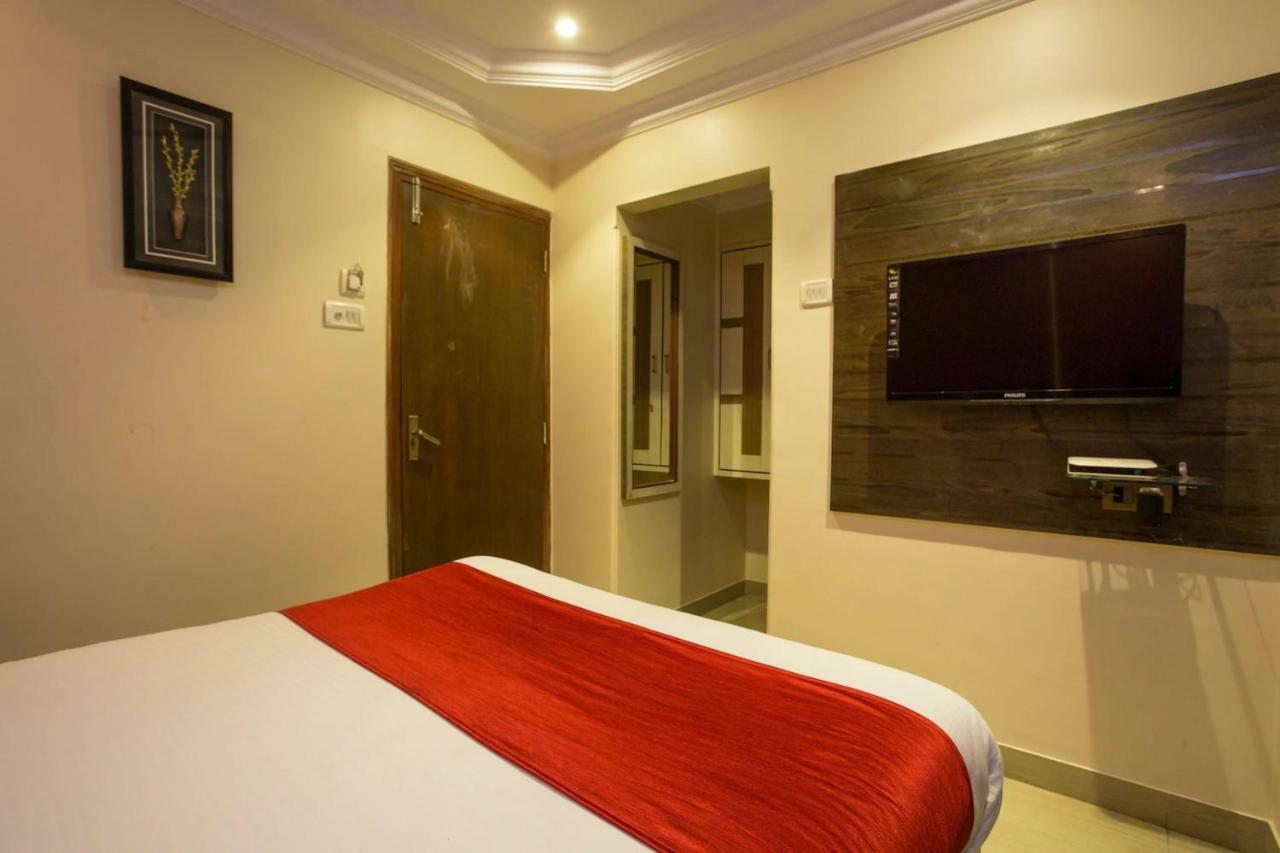 Hotel Grace Inn Мумбаи Экстерьер фото
